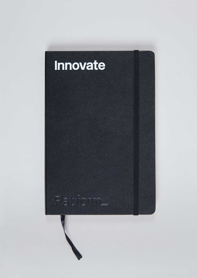 Moleskine notebook.