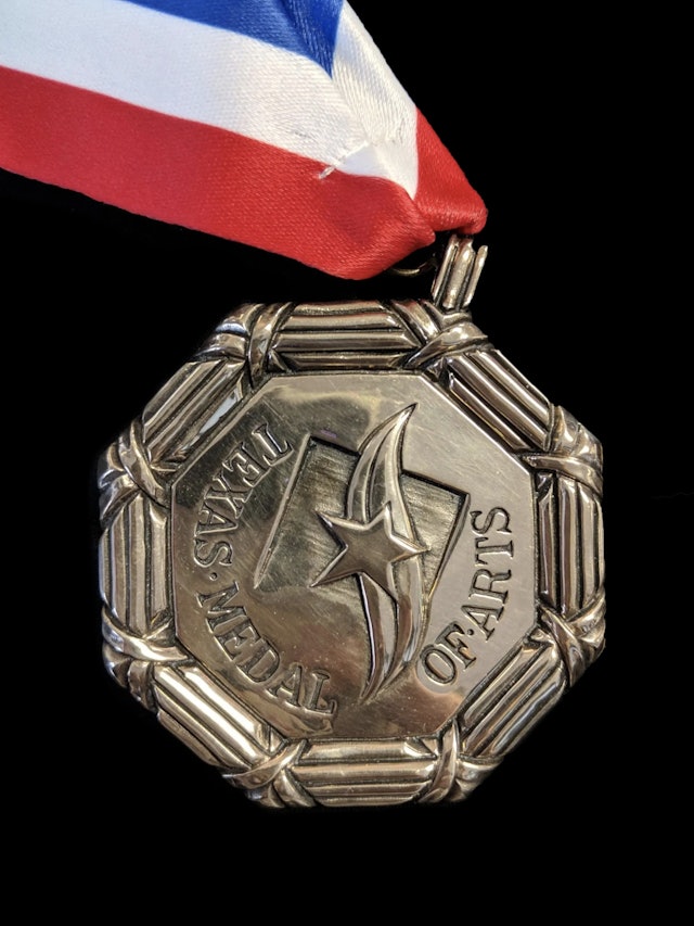 Previous design of the TMAA medal.