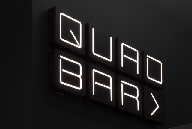 Signage for the Quad Bar.