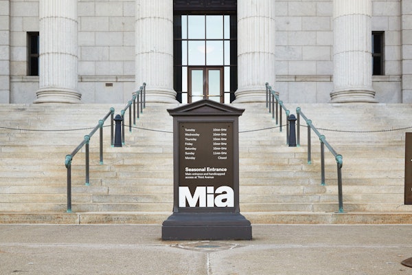 The logo applied to historical signage at Mia’s seasonal entrance.