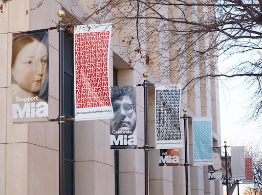 Banners from the rebranding launch campaign along the street outside the museum.
