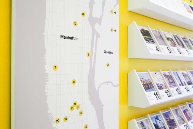 A corresponding wall map shows the locations of the Buildings of the Day.