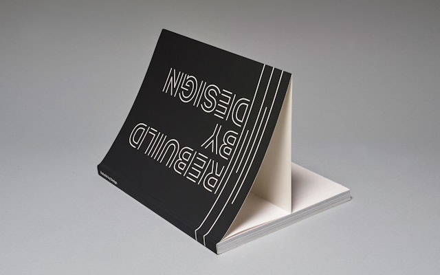 The custom typography and use of black and white gives the book a strong visual presence.