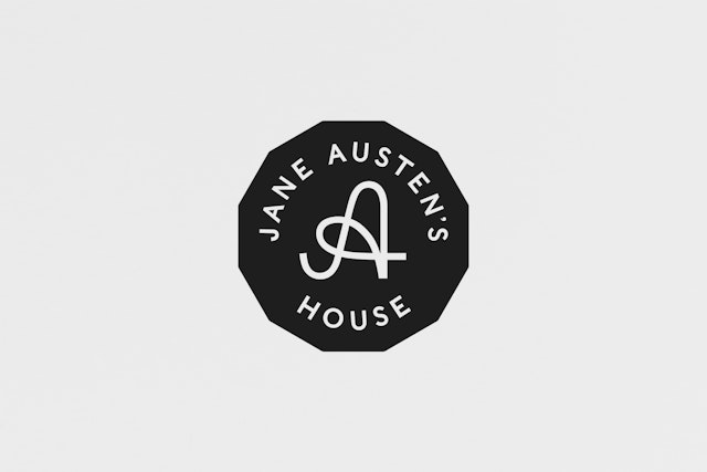 The secondary logo which employs a holding shape based on Jane’s writing table