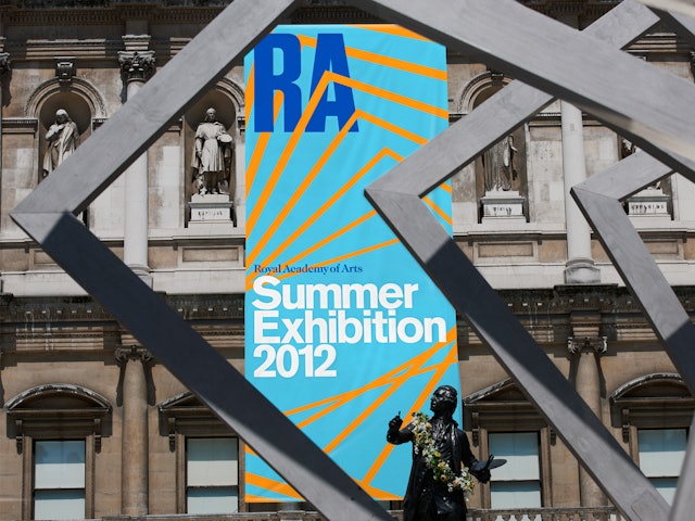 Summer Exhibition poster design hung in the RA's courtyard