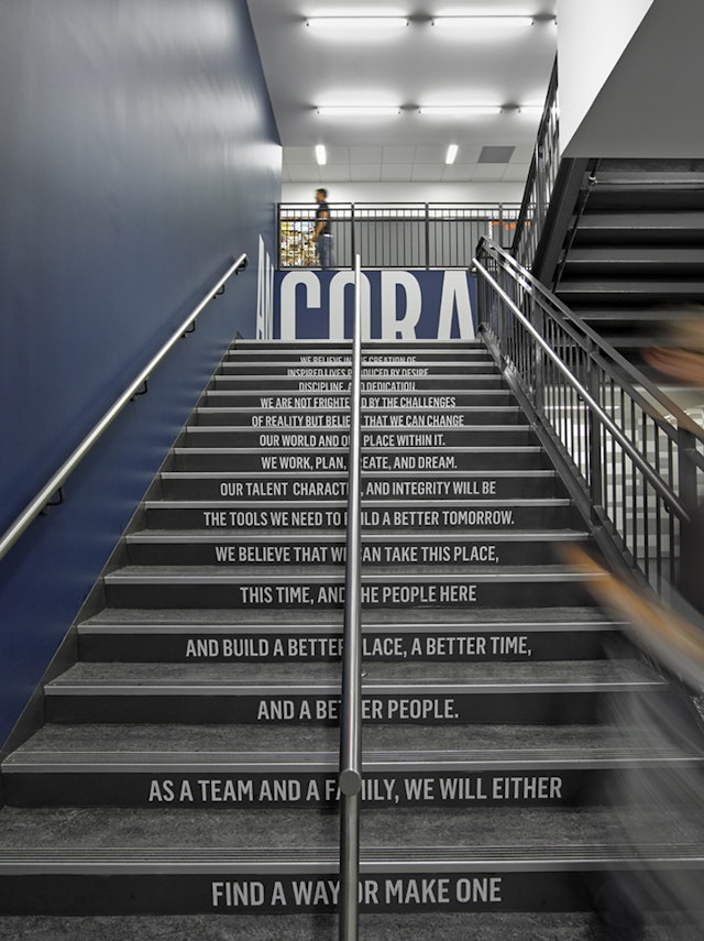 The KIPP credo is displayed on the risers of the central stairway.