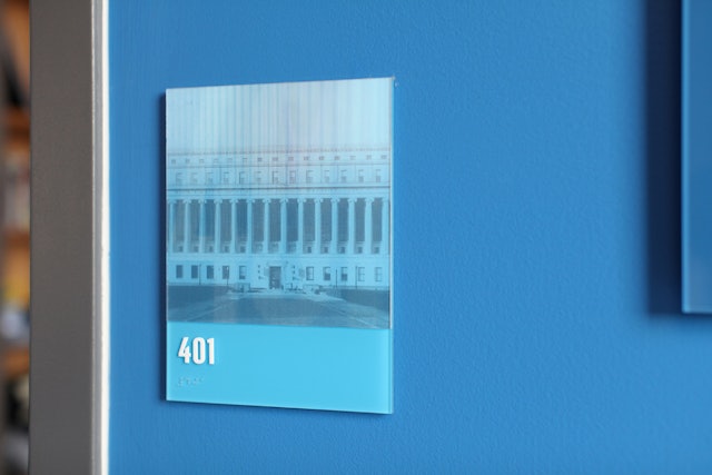 An image of Columbia University emerges from the classroom sign.