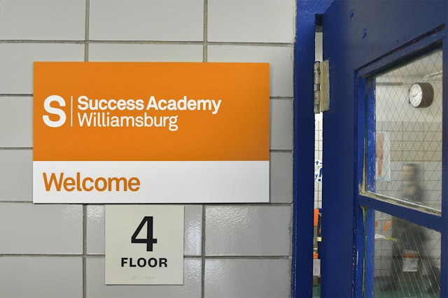 Entry signage at Success Academy Williamsburg.