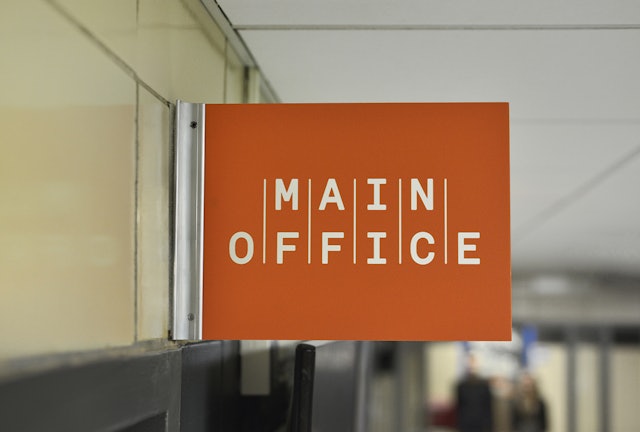 Office signage echoes the identity.