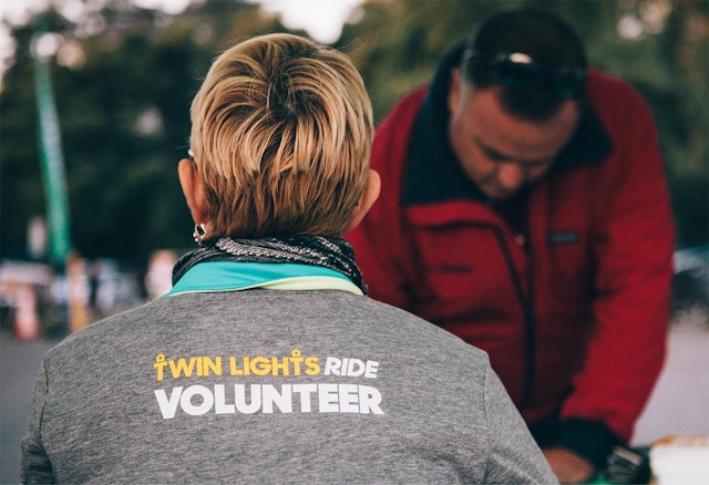 Custom icons for Bike New York's annual Twin Lights Ride appear on a t-shirt for the event.