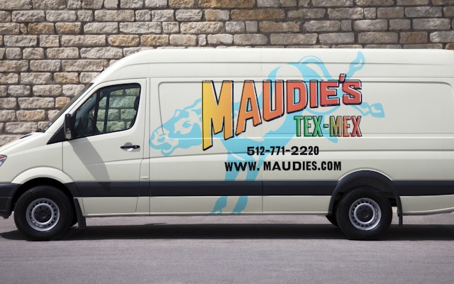 The Maudie's identity displayed on the side of a delivery truck.