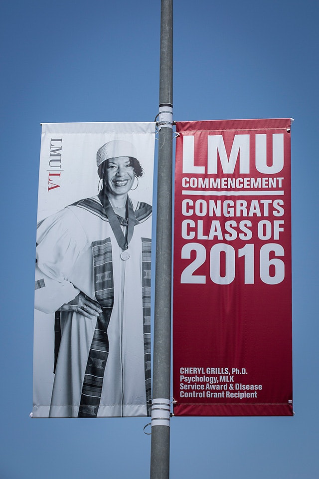 Banners featuring a recent graduate.