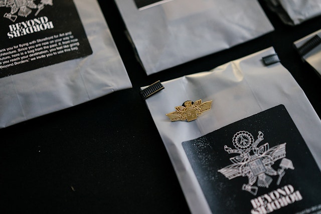 Air-sickness bags with wing pins.