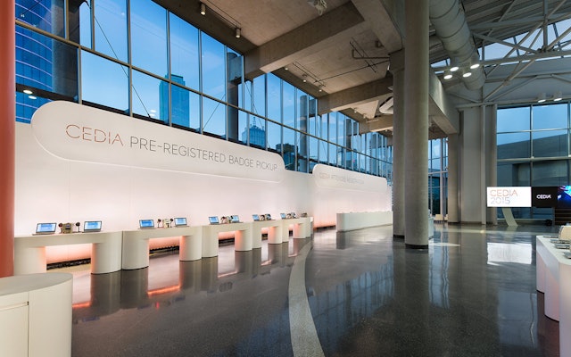 The look and feel of the CEDIA exhibit design was extended to the convention center’s arrival halls.